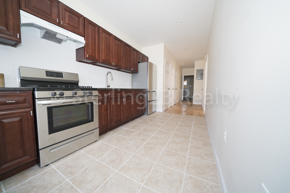 39-26 55th Street - Photo 0