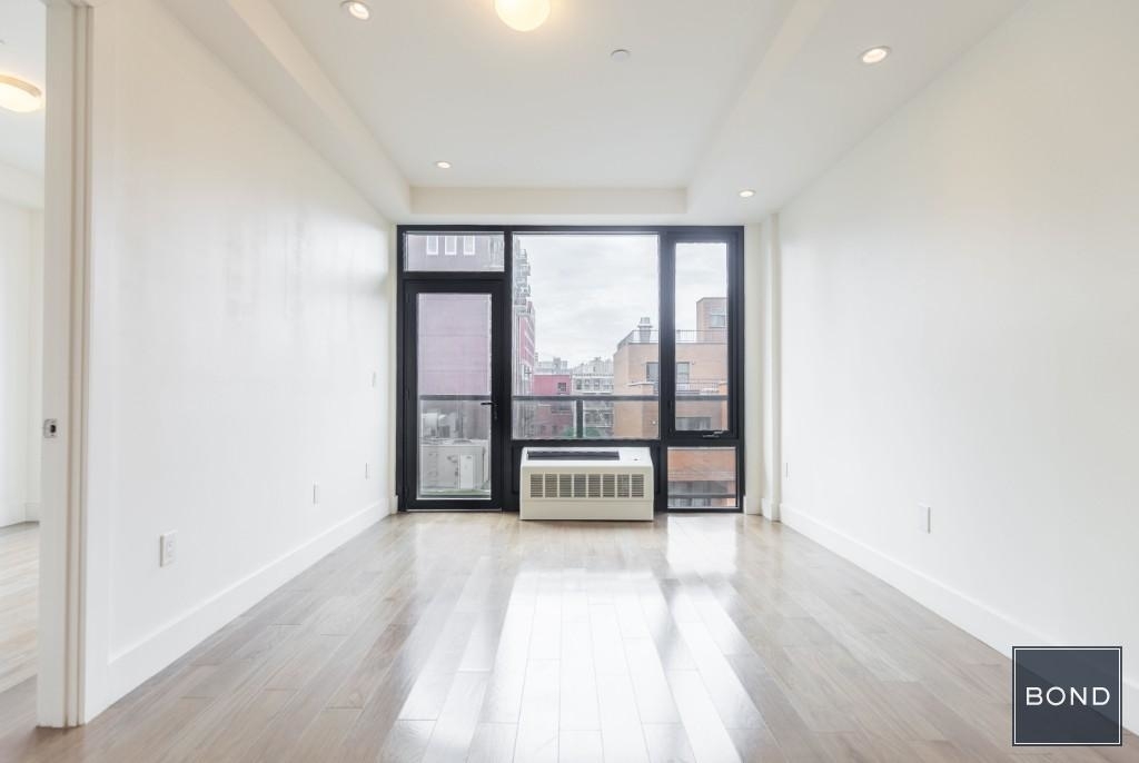 399 East 8th Street - Photo 6