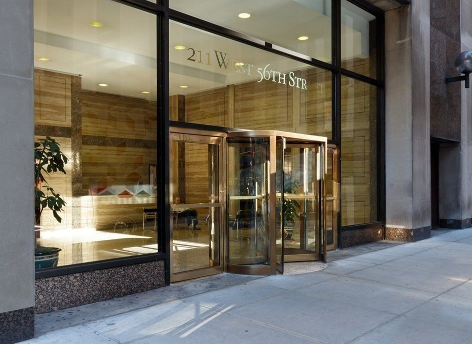 211 West 56th St  - Photo 1