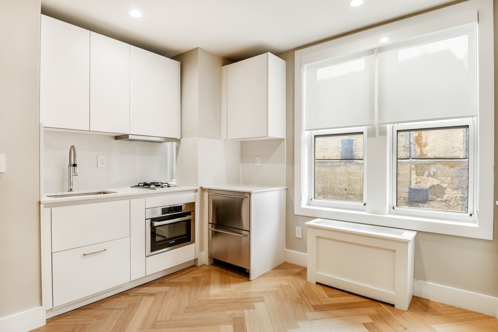 220 West 24th St  - Photo 1