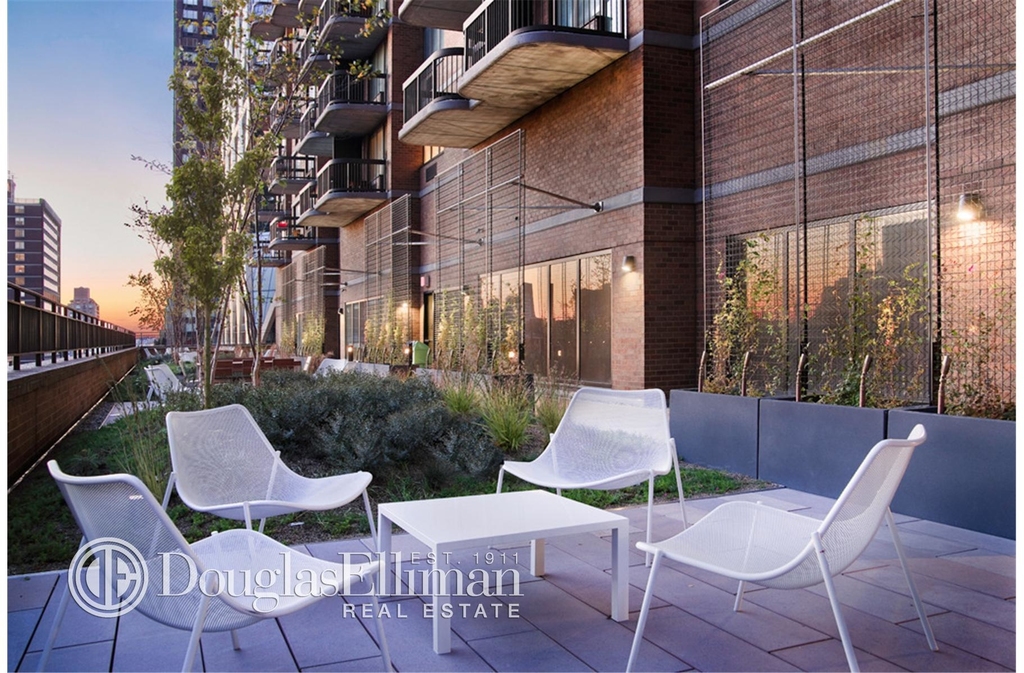 235 West 56th St - Photo 5