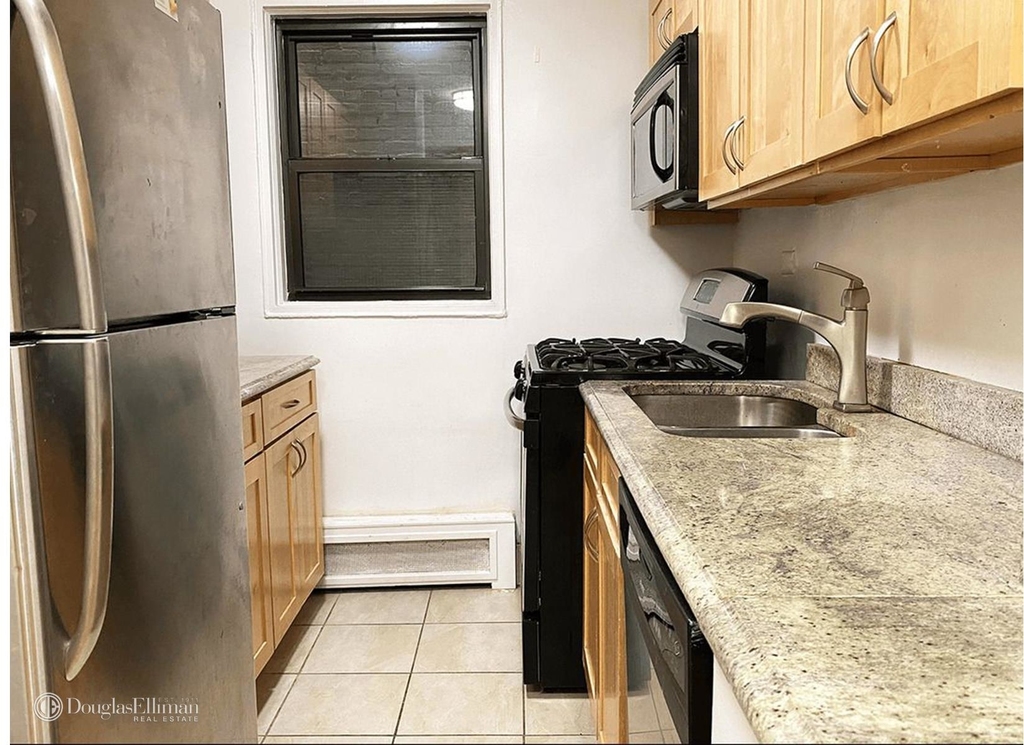 320 East 52nd St - Photo 1