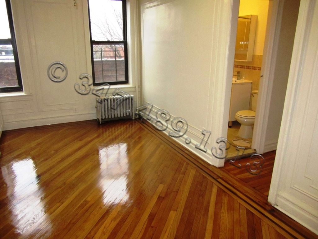 262 E 55th St  - Photo 1