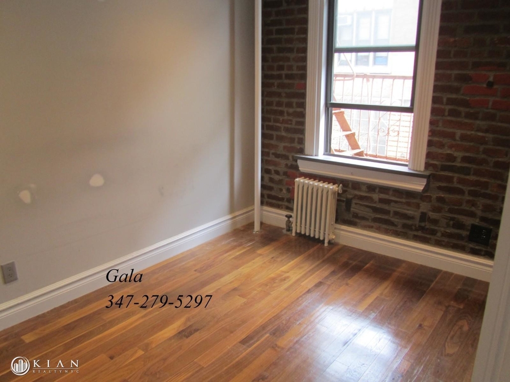 E 13th St. - Photo 2