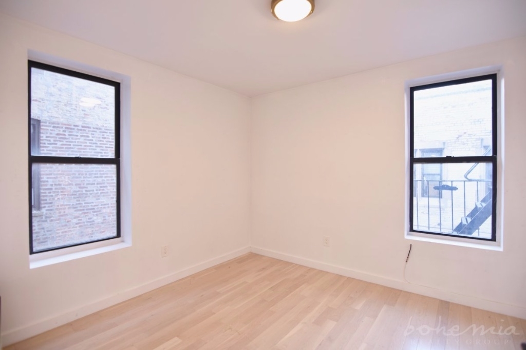 137 W 137th St - Photo 1