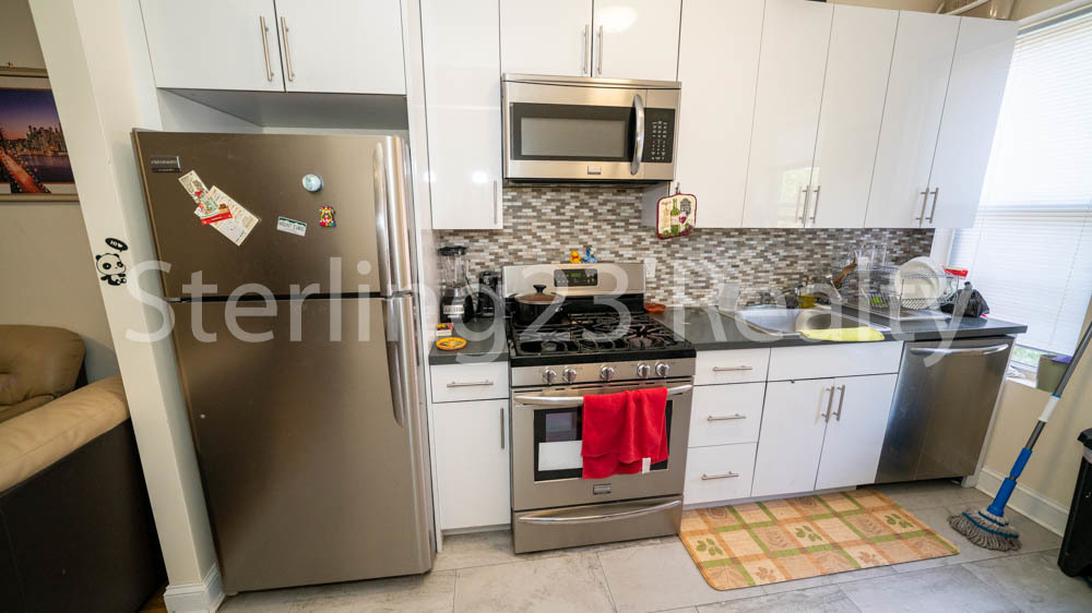 41-32 52nd Street - Photo 2