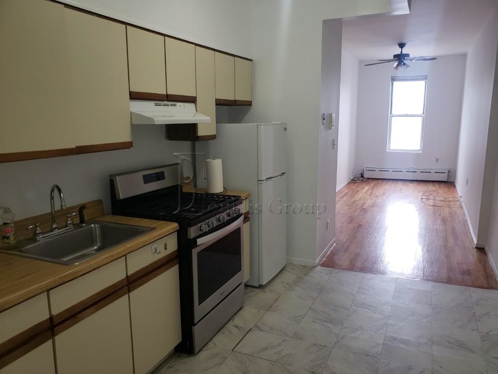 35-05 Ditmars Blvd - Photo 1