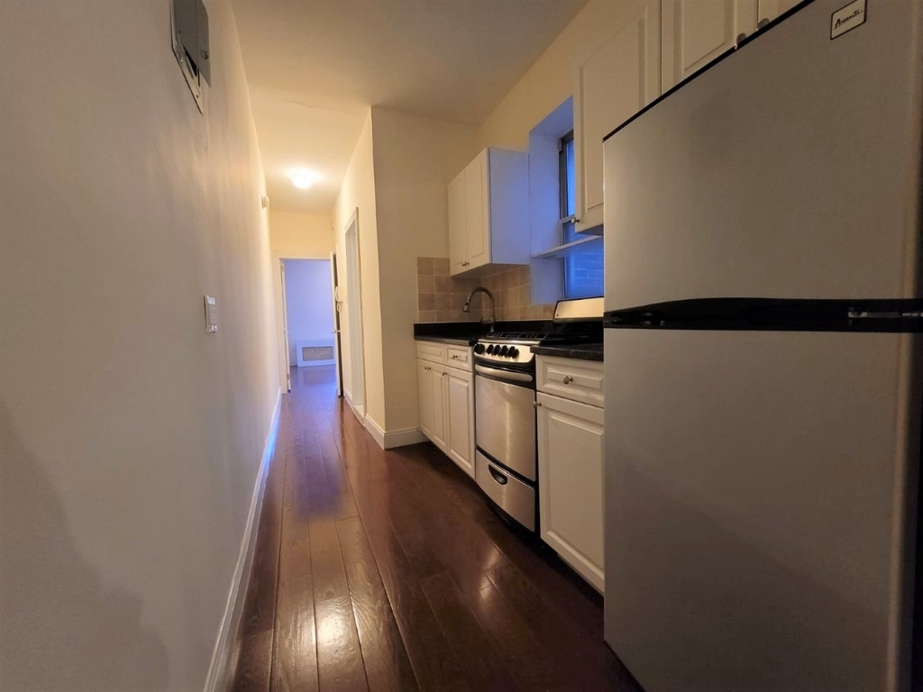 449 West 43rd St - Photo 1