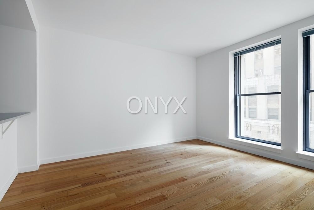 Wall St. - 1BR plus HO - Photo 1