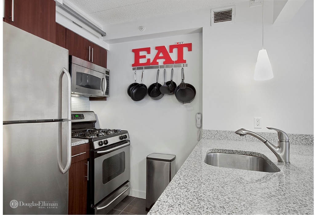 555 West 23rd St - Photo 0