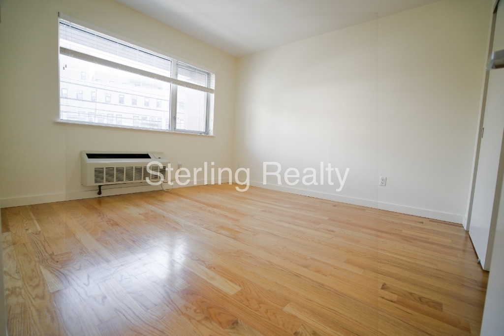 23-15 Astoria Boulevard - Photo 6