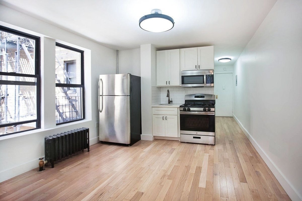 137 W 137th St - Photo 1