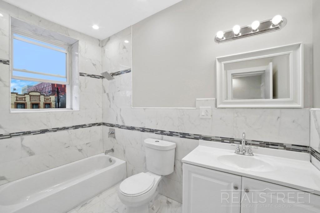 253 East 93rd St - Photo 9