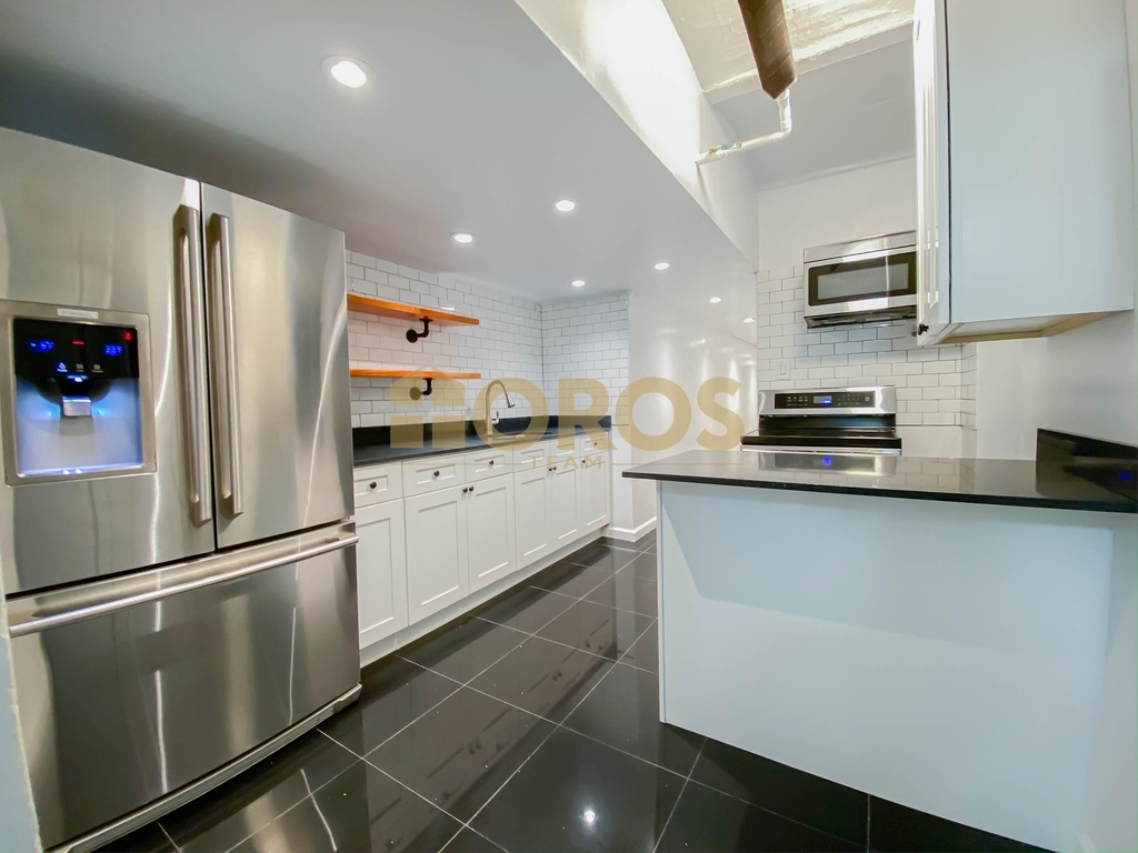 217 East 10th Street - Photo 0