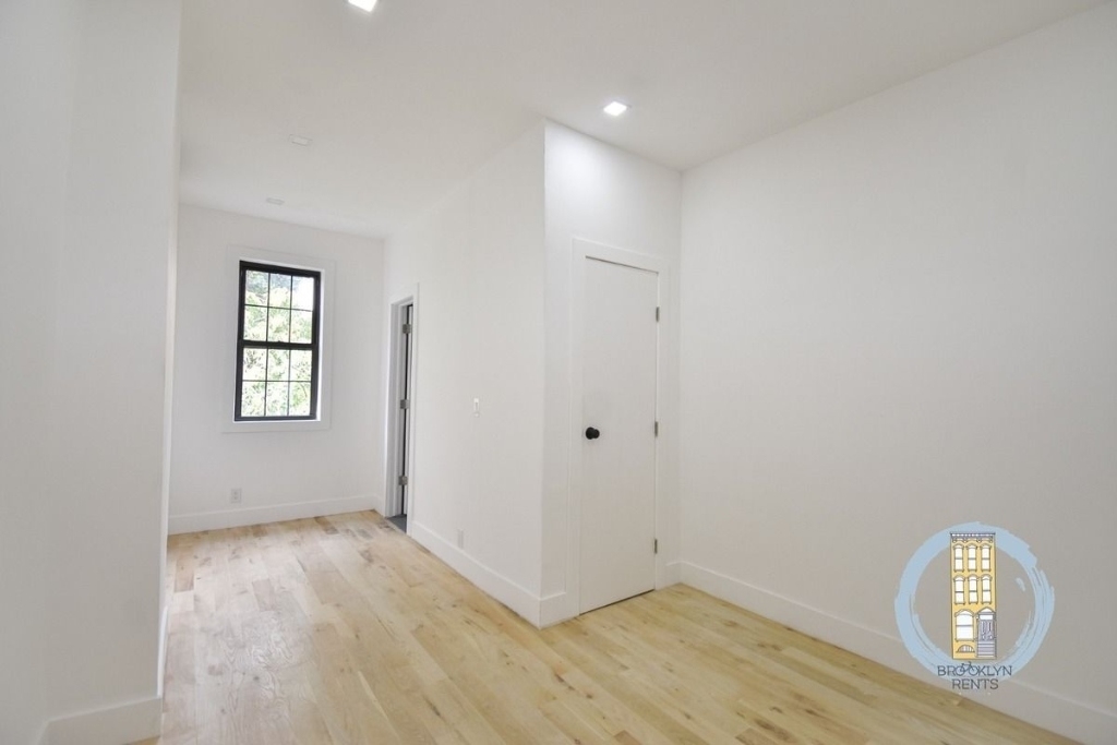 15-11 Cooper Avenue - Photo 1