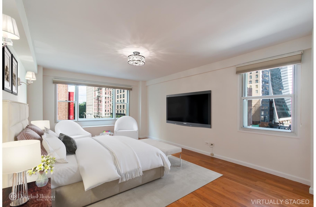 100 West 57th St - Photo 9