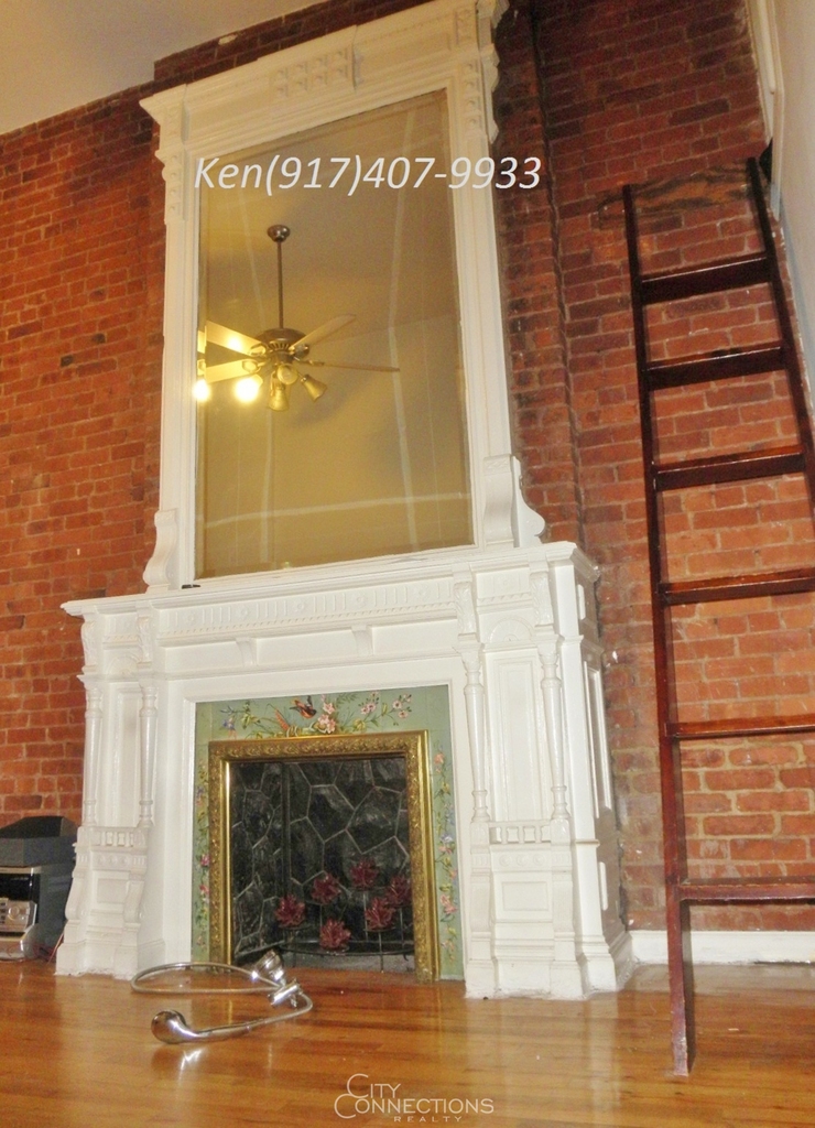 112 W 71st St - Photo 9