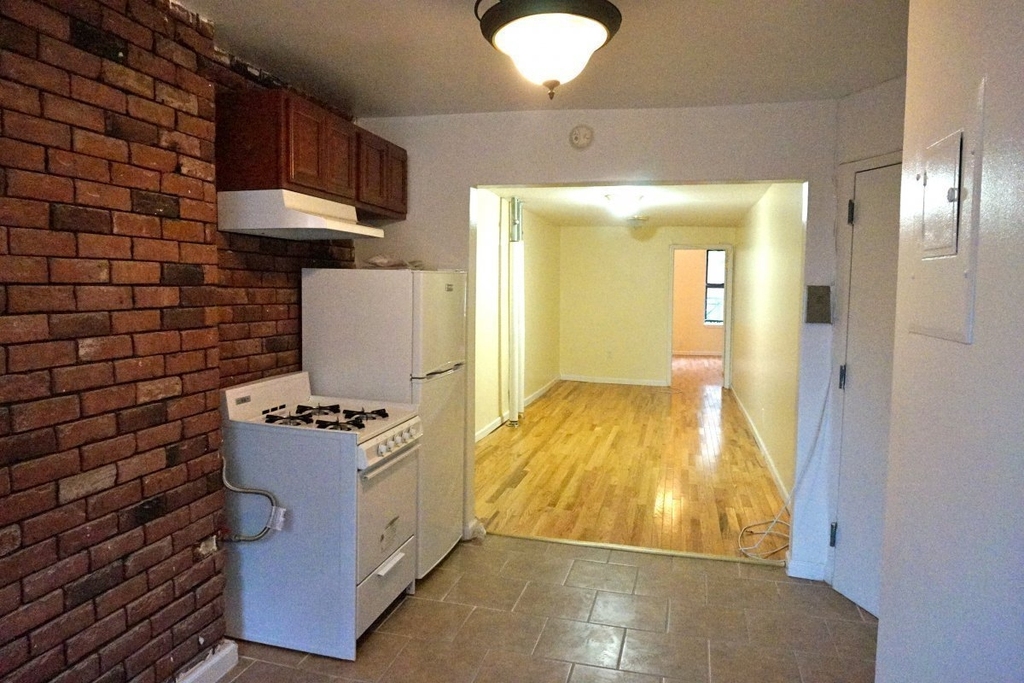 319 East 115th Street - Photo 0