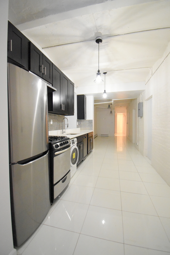 309 W 111th St - Photo 6