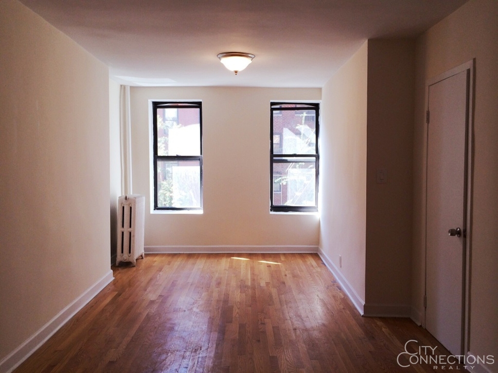 325 E 54th St - Photo 0