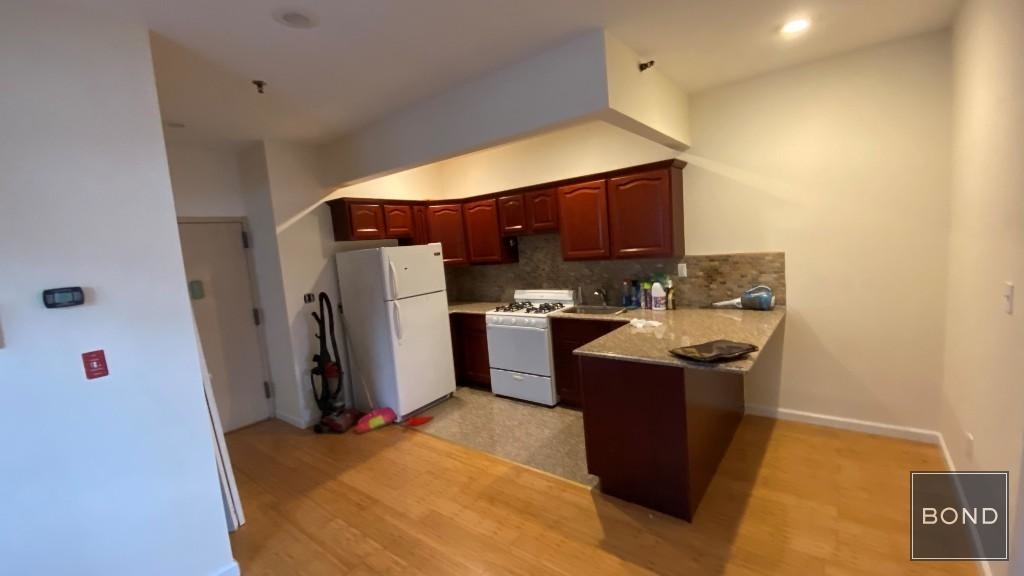 25-66 33rd Street ZIP 11102 - Photo 1