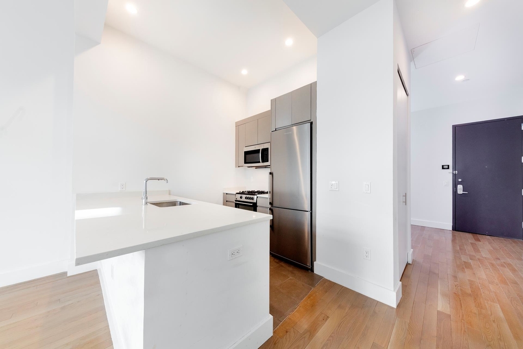 321 W 37th St - Photo 1