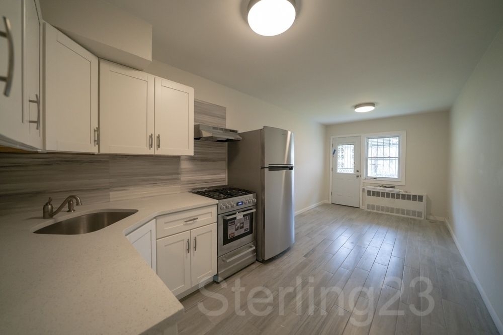33-10 23rd Street - Photo 1