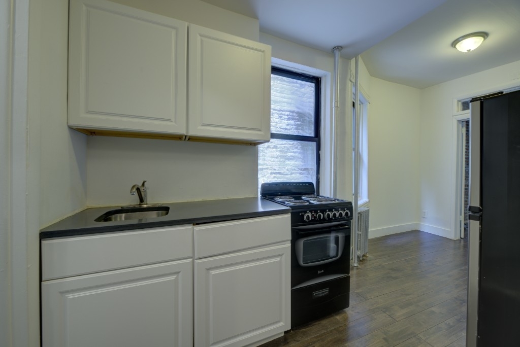 411 W 48th Street - Photo 1