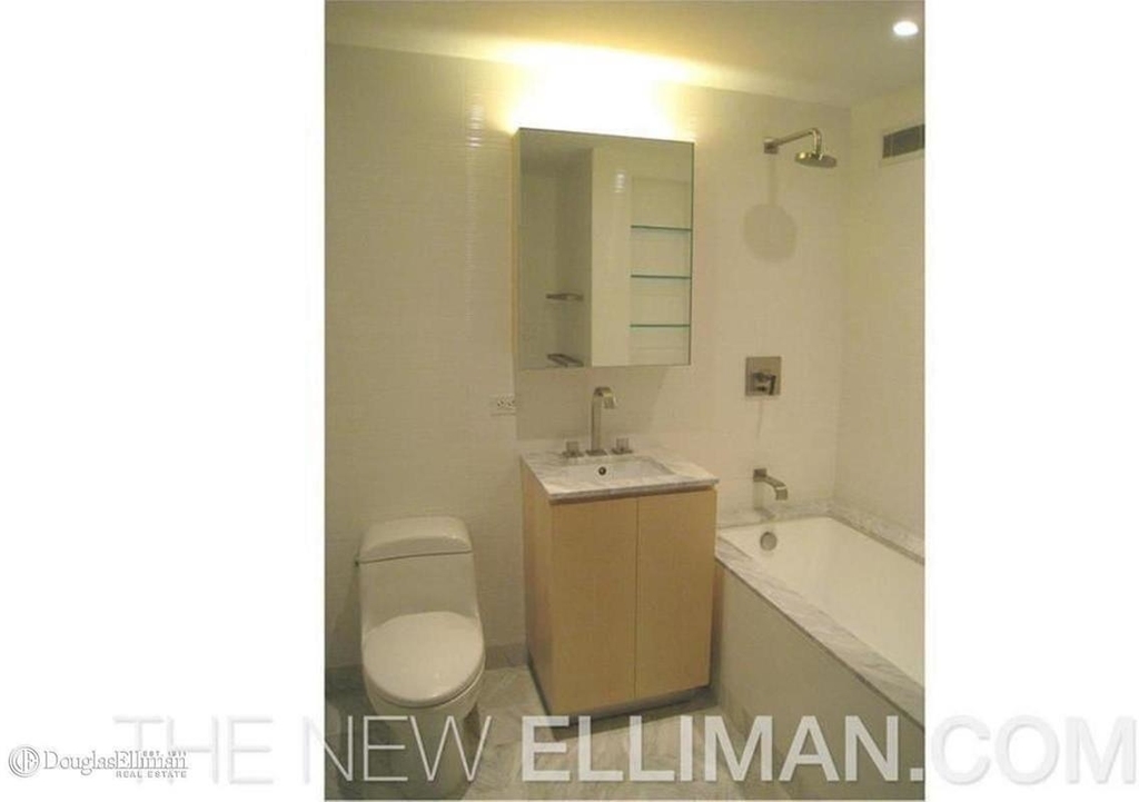 211 E 51st St - Photo 6