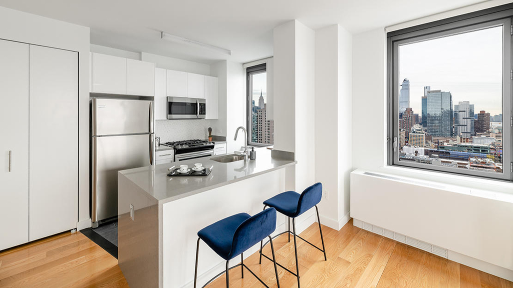 W 57th St & 11th Ave - Rented - Photo 4