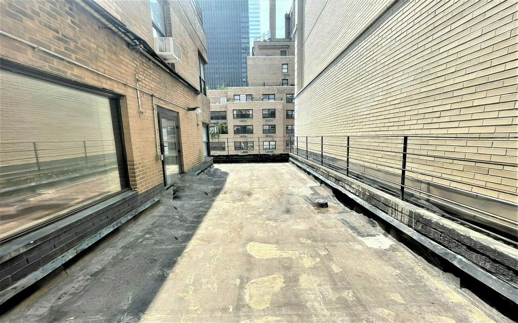 141 East 56th Street - Photo 9