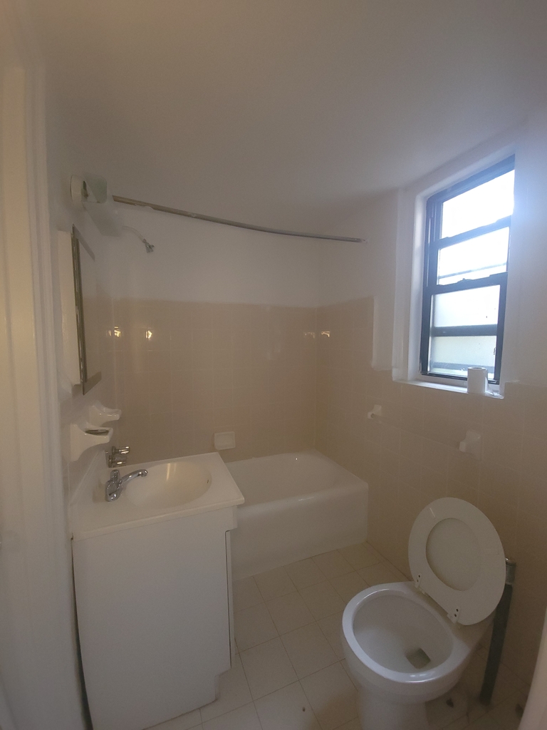 455 W 34th St  - Photo 6