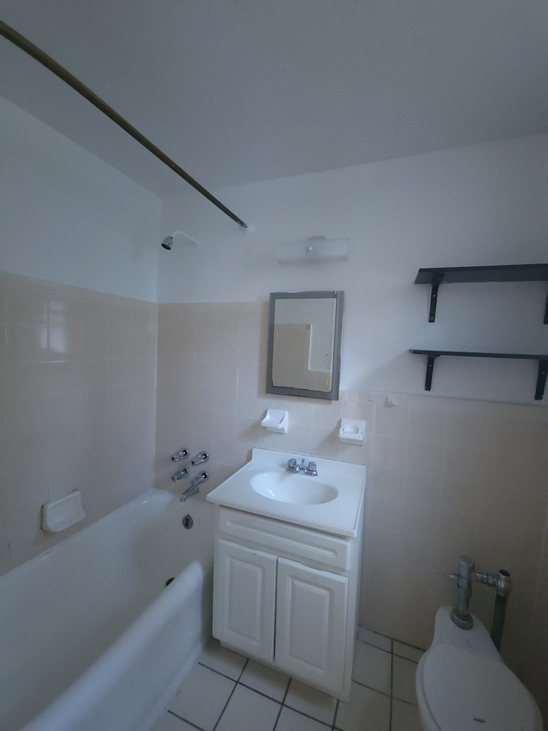 455 W 34th St  - Photo 5