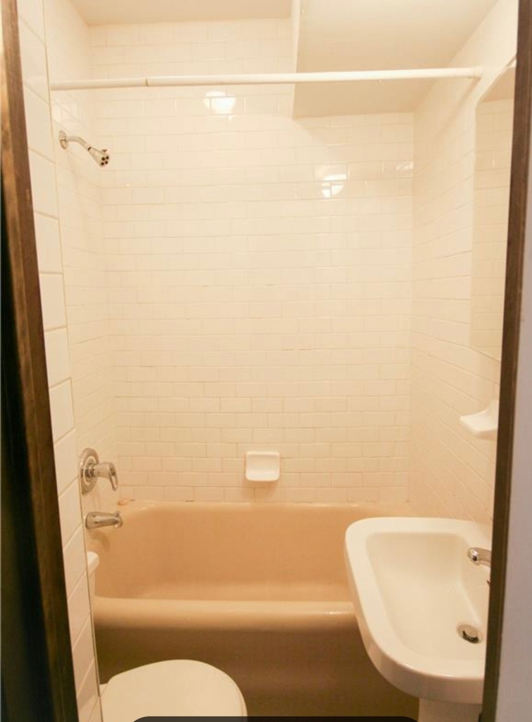 Great Value- Sunny West Village Studio, doorman building, laundry in the building. Kitchenette, hard wood floors. One month broker's fee.  - Photo 3