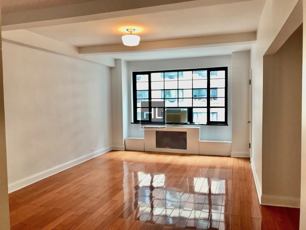 310 East 44th Street - Photo 1