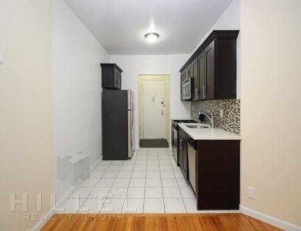 118-80 Metropolitan Avenue - Photo 1