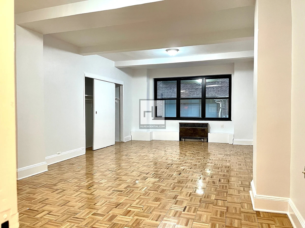 310 East 44th Street - Photo 1