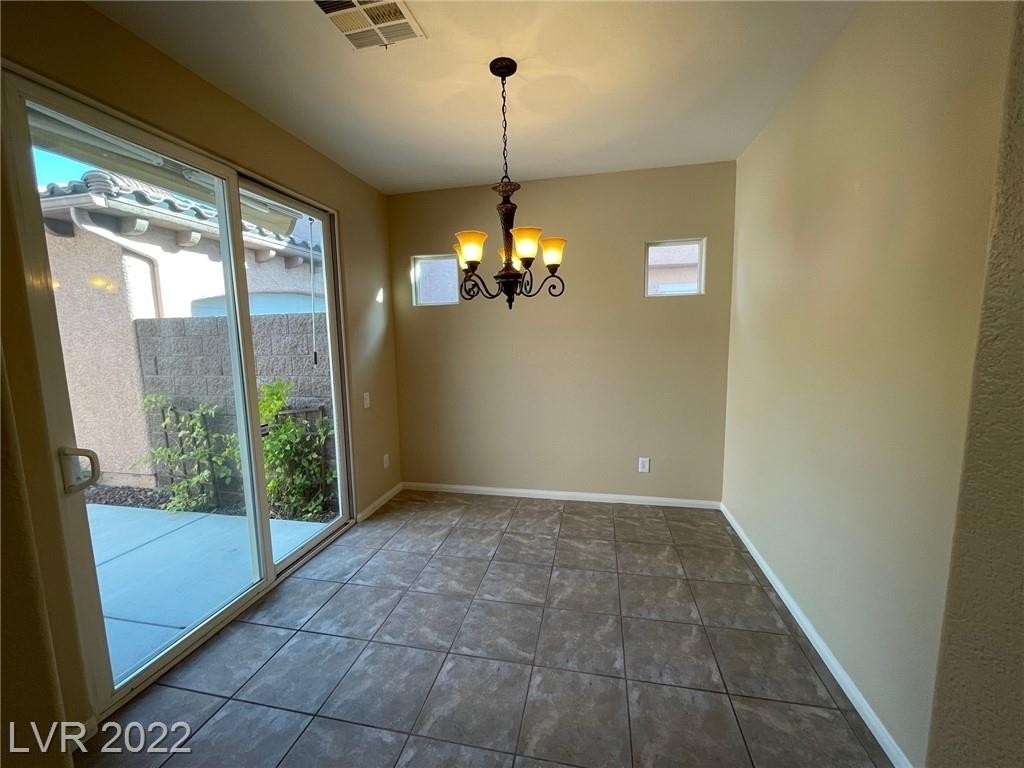 10339 Howling Coyote Avenue - Photo 5