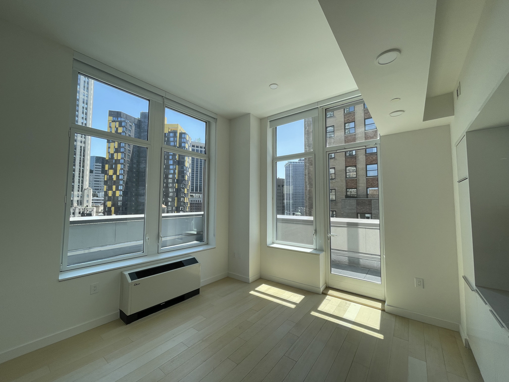 Penthouse w/ Terrace at Broad Street (FiDi) - Photo 2