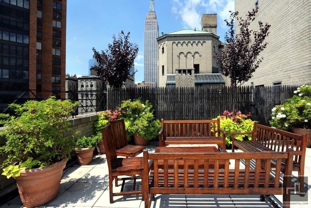 115 East 34 Street - Photo 0