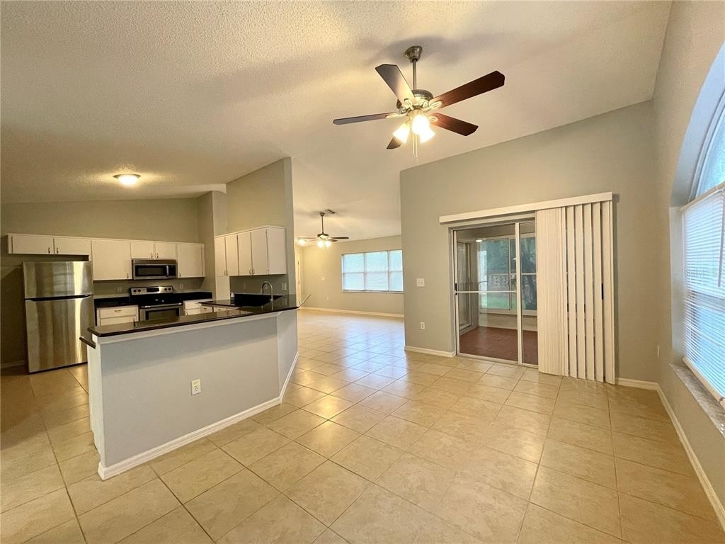 6033 Canopy Oaks Court - Photo 4