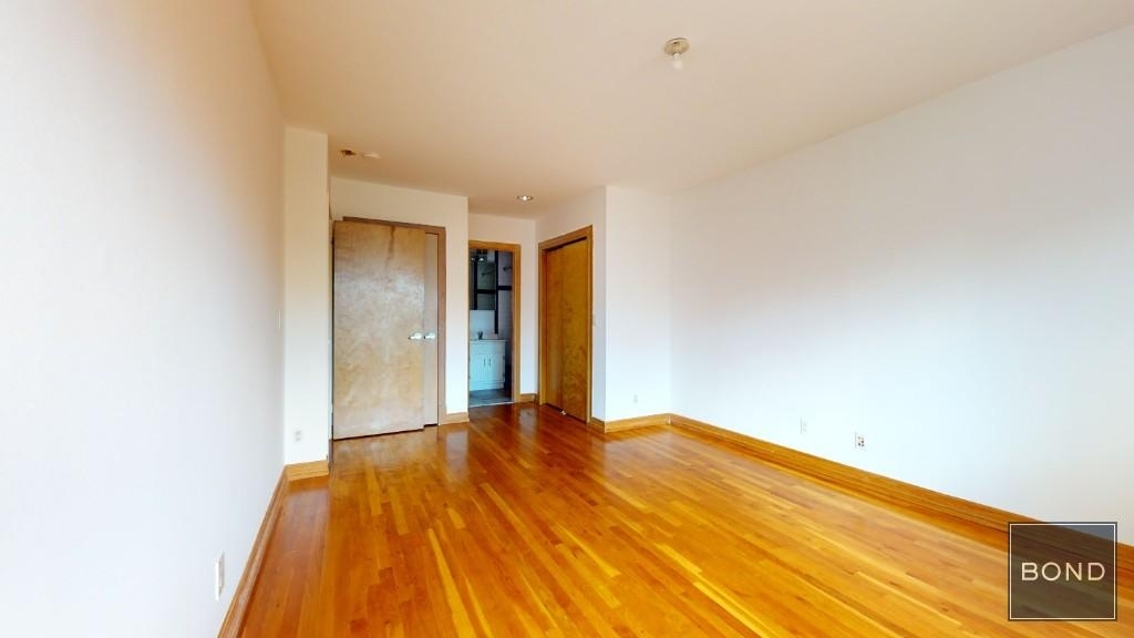 E.3rd St & Ave C   3bed/2bath - Photo 2