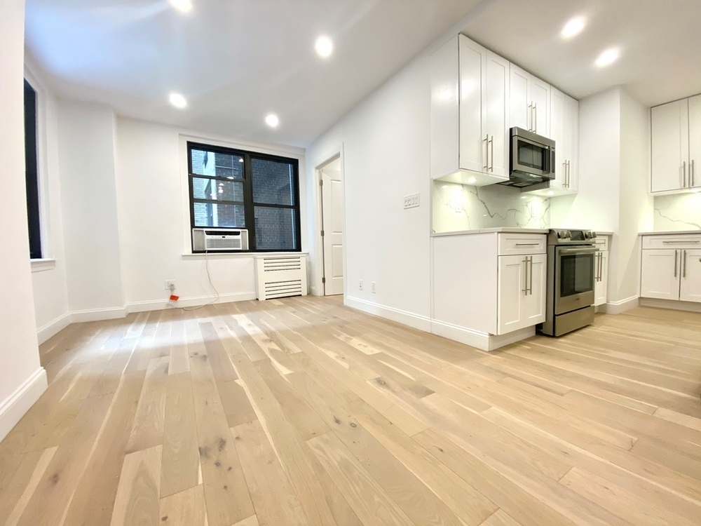 160 East 48th Street - Photo 0