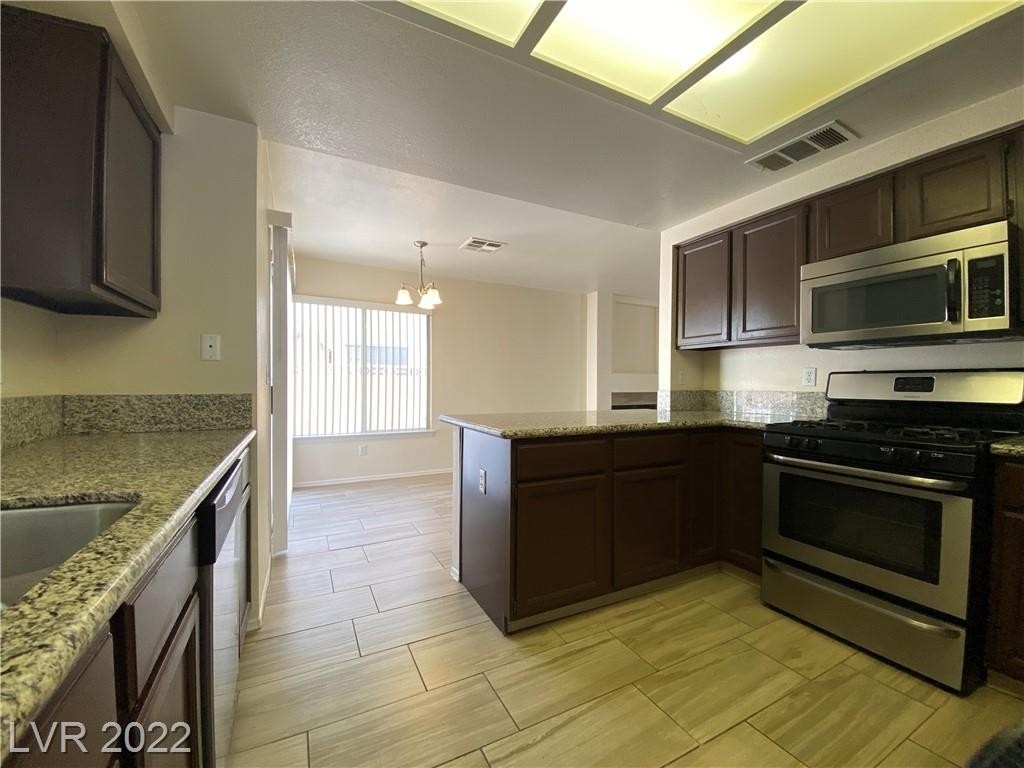 9312 Magic Flower Avenue - Photo 12