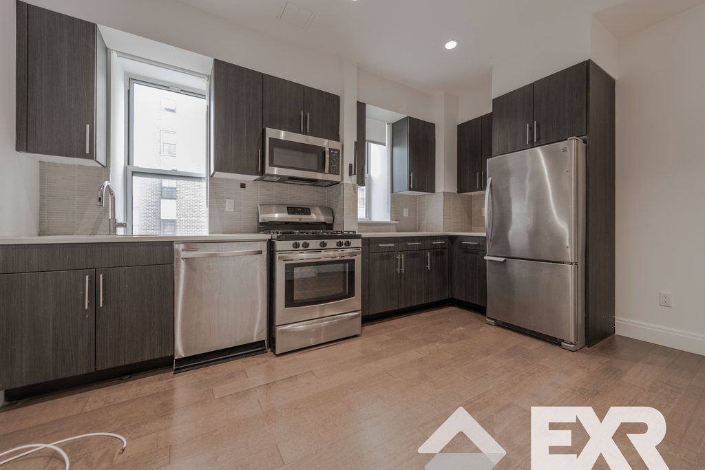 215 West 116th Street - Photo 0