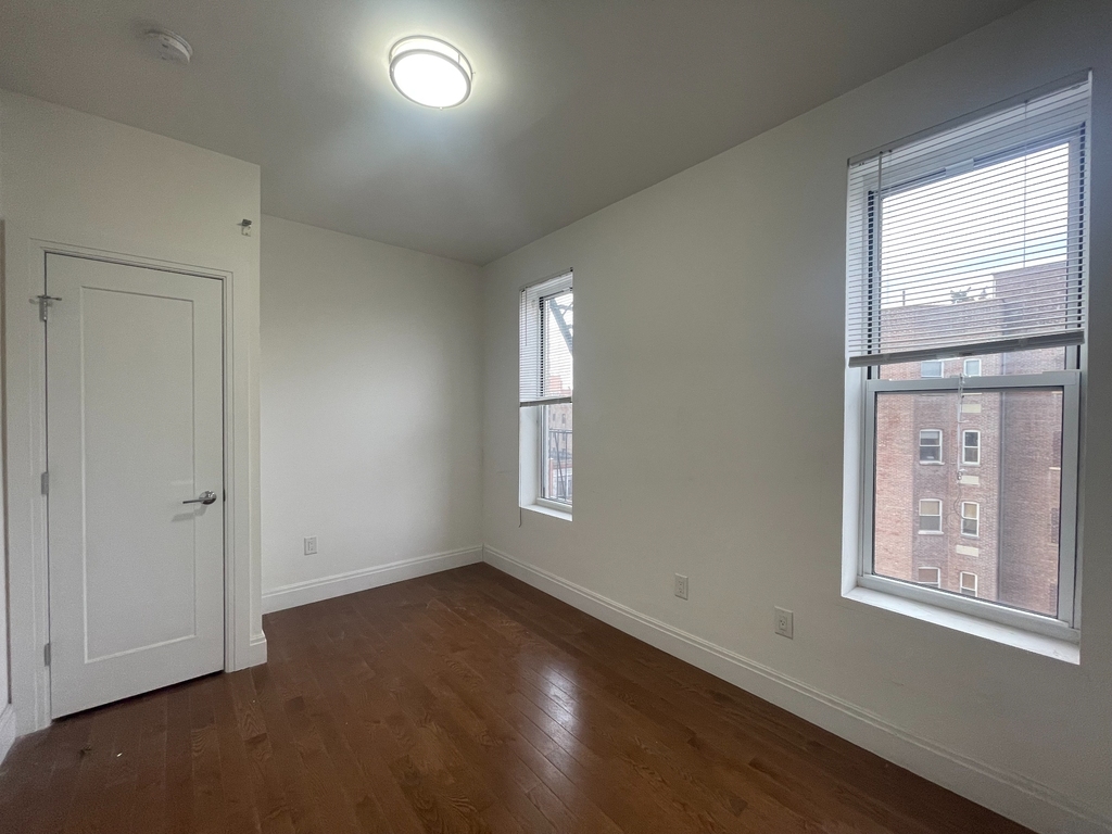 215 West 116th Street - Photo 0