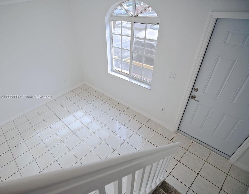 655 W 68th St - Photo 7