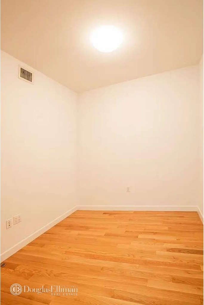 454 W 54th St - Photo 9