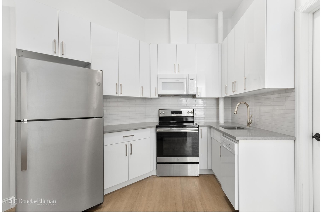 56-50 Myrtle Avenue - Photo 1