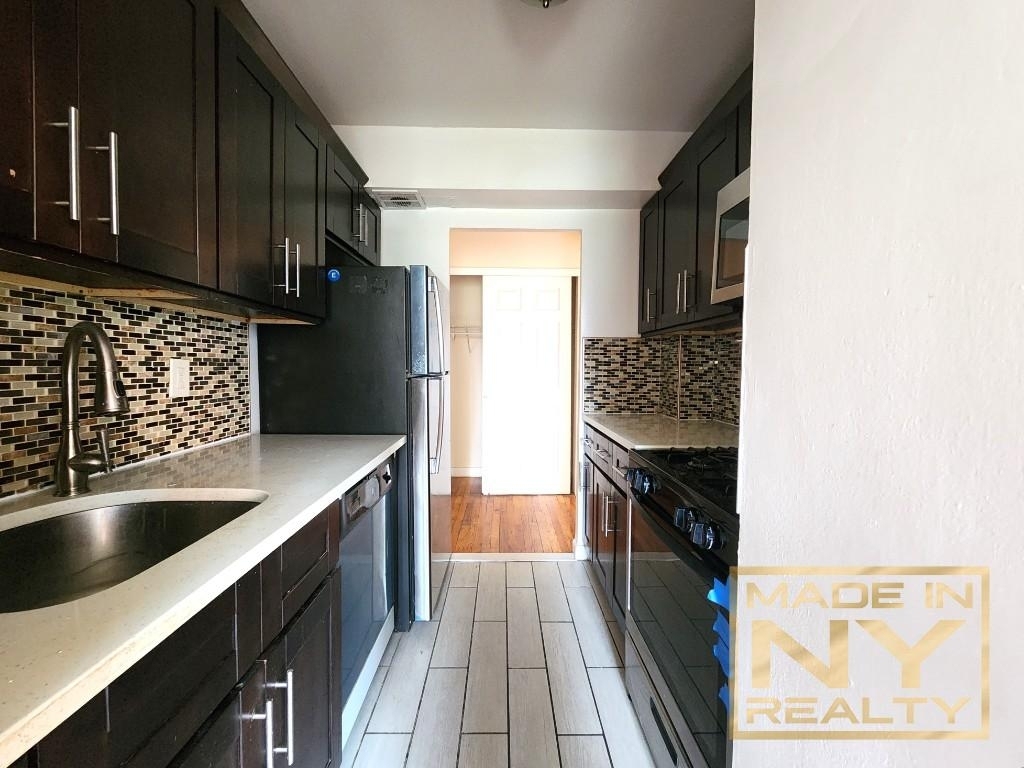 139-55 35th Ave - Photo 1